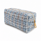 a mixed colors with blue, blue, gold tweed cosmetic case with gold zipper on white background