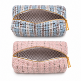 2 cosmetic case in blue and pink tweed fabric zipper opened and showing polkadot lining