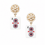 A pair of gold and white pearl drop earrings featuring rectangular white tiles printed with a red, black, and blue '2' playing card design, shown on a plain white background.