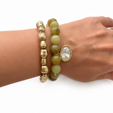 2 beaded bracelets over a wrist