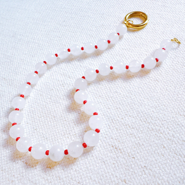  Delicate necklace featuring soft milk-toned stone beads—offering a moonlit, earthy elegance perfect for everyday or layered looks