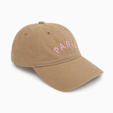 Beige cap with 'PARIS' embroidered in pink on a white background