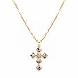 Dalmatian jasper color stone bead cross pendant on gold chain. white background