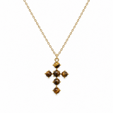 tiger eye brown color stone bead cross pendant on gold chain. white background