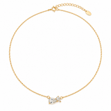 Full view of the Pear Cut Crystals Pendant Necklace with gold cable chain, spring ring clasp and 2 inch extender with logo tag
