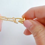 Modern necklace combining half white pearls and half elongated gold chain links. The design blends classic sophistication with a contemporary edge for a balanced, elegant look.