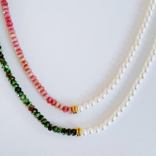 Unique necklace featuring alternating freshwater pearls and gemstone accents, creating a harmonious blend of classic charm and radiant sophistication.