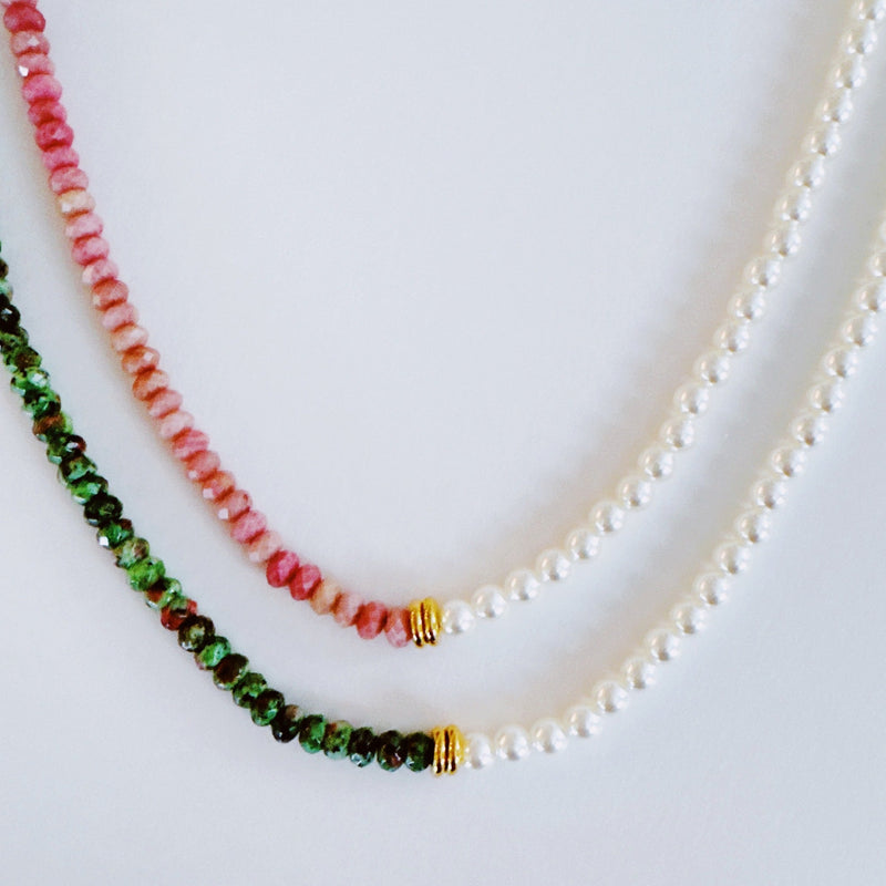 Unique necklace featuring alternating freshwater pearls and gemstone accents, creating a harmonious blend of classic charm and radiant sophistication.