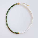 Unique necklace featuring alternating freshwater pearls and gemstone accents, creating a harmonious blend of classic charm and radiant sophistication.