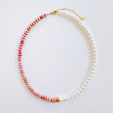 Unique necklace featuring alternating freshwater pearls and gemstone accents, creating a harmonious blend of classic charm and radiant sophistication.