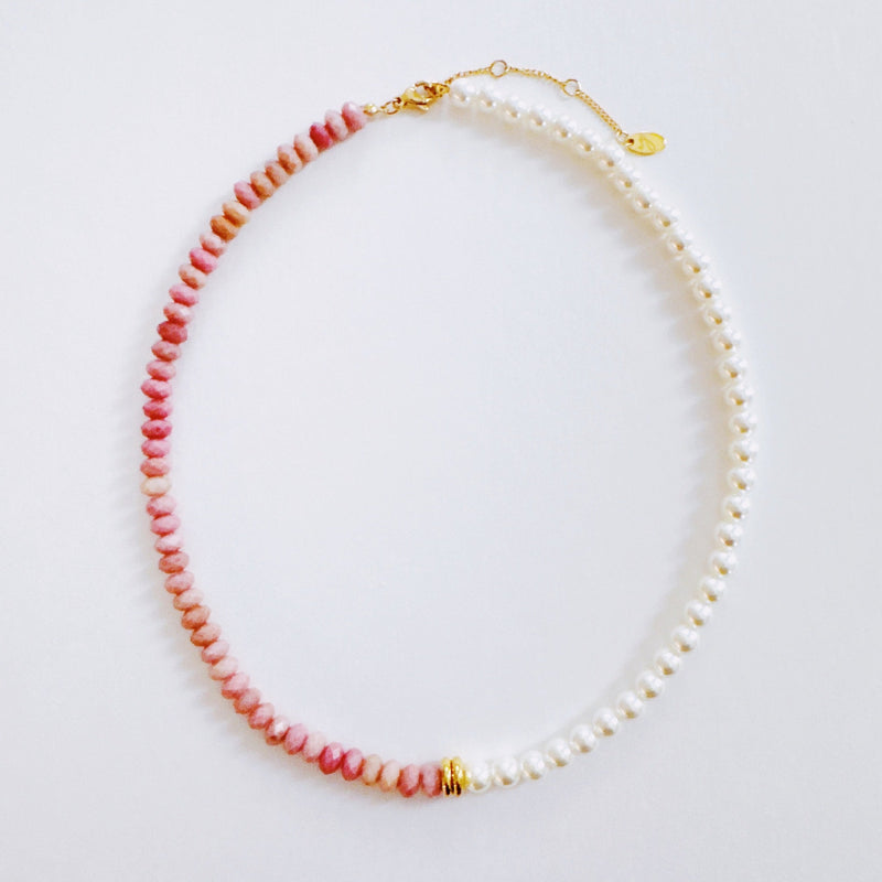 Unique necklace featuring alternating freshwater pearls and gemstone accents, creating a harmonious blend of classic charm and radiant sophistication.