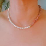Unique necklace featuring alternating freshwater pearls and gemstone accents, creating a harmonious blend of classic charm and radiant sophistication.