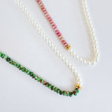 Unique necklace featuring alternating freshwater pearls and gemstone accents, creating a harmonious blend of classic charm and radiant sophistication.