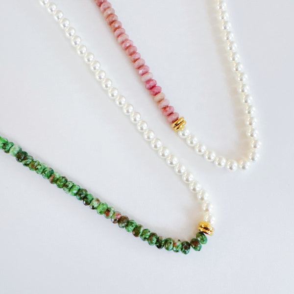 Unique necklace featuring alternating freshwater pearls and gemstone accents, creating a harmonious blend of classic charm and radiant sophistication.