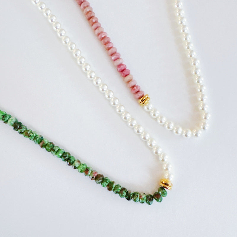 Unique necklace featuring alternating freshwater pearls and gemstone accents, creating a harmonious blend of classic charm and radiant sophistication.