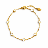 Delicate gold bracelet featuring a petite clover charm on a single fine chain. The minimalist design adds a touch of everyday elegance with its subtle shine and timeless silhouette, perfect for layering or wearing solo.