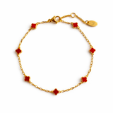 Delicate gold bracelet featuring a petite clover charm on a single fine chain. The minimalist design adds a touch of everyday elegance with its subtle shine and timeless silhouette, perfect for layering or wearing solo.