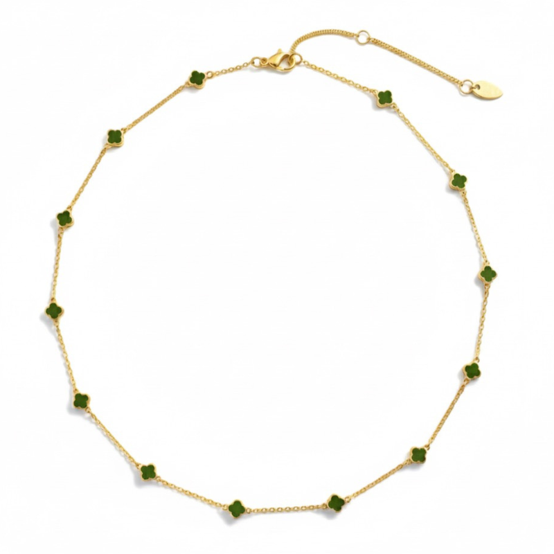 Gold-toned necklace featuring a delicate colored clover pendant, suspended on a fine chain for a soft pop of charm and color.