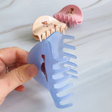 Preppy-inspired bear hair claw clips featuring fashionable teddy bear dressed in vintage collegiate outfits. Each clip showcases a different bear character on a pastel background, adding a playful yet polished touch to any hairstyle.