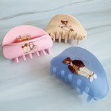 Preppy-inspired bear hair claw clips featuring fashionable teddy bear dressed in vintage collegiate outfits. Each clip showcases a different bear character on a pastel background, adding a playful yet polished touch to any hairstyle.
