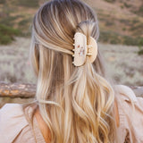 Preppy-inspired bear hair claw clips featuring fashionable teddy bear dressed in vintage collegiate outfits. Each clip showcases a different bear character on a pastel background, adding a playful yet polished touch to any hairstyle.