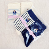 Set of cozy crew socks featuring charming preppy bear illustration in classic outfits, adding a playful and nostalgic touch to everyday wear.