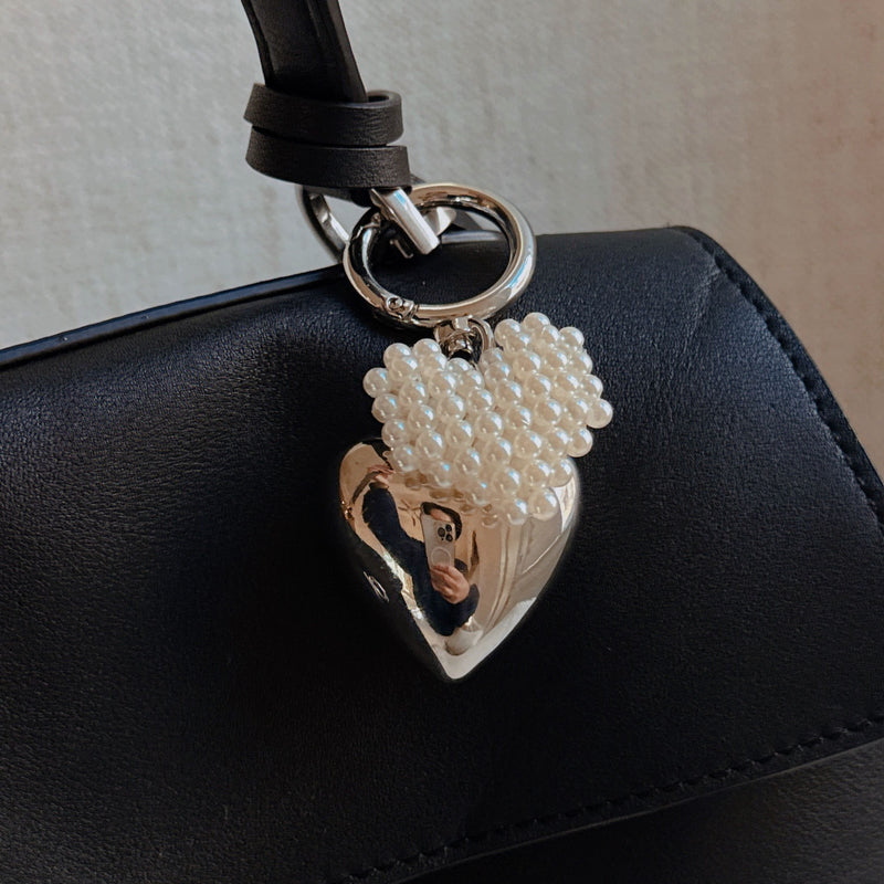 Puff Heart Pearl Heart Bag Charm
Silver and Minimalistic