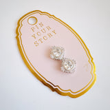 Set of two hexagon-shaped scarf magnetic brooch pins or earrings with a modern, abstract design. Each brooch features a sleek finish and sculptural angles, offering a stylish and functional accent for securing scarves or accessorizing garments.