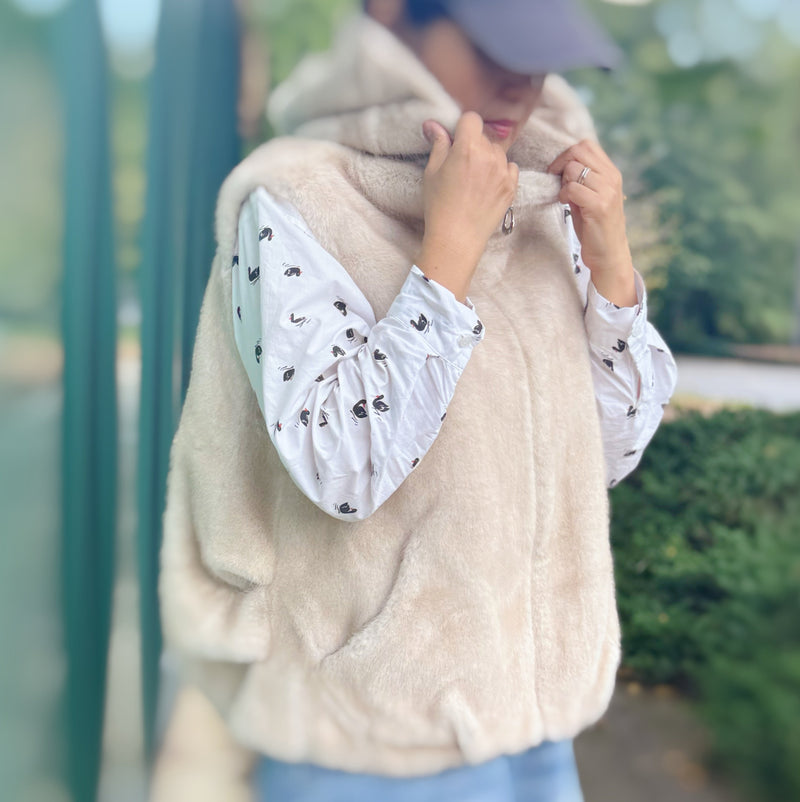 Real-Feel-Faux-Mink-Vest-Hooded-And-Effortless-Beige-Mink-on-person-zipped-up