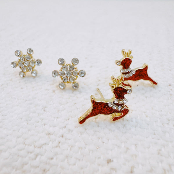Set of mini stud earrings featuring snowflake and reindeer charms – dainty and winter-themed