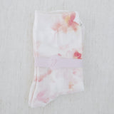 Soft and stylish socks adorned with delicate watercolor-inspired florals, offering a dreamy and romantic touch to everyday wear.