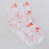 Soft and stylish socks adorned with delicate watercolor-inspired florals, offering a dreamy and romantic touch to everyday wear.