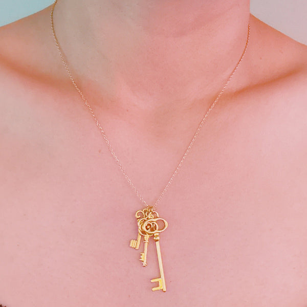 Gold key charm necklace – delicate vintage style