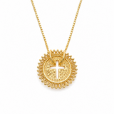 Gold necklace with a circular pendant featuring a cross on a white background