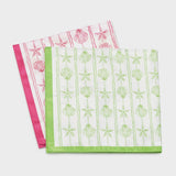 Two kitchen towels with shell and starfish patterns on a white background