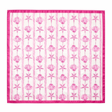 Pink and white patterned fabric with shell and starfish designs on a white background