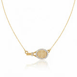 Chic and sporty necklace featuring a sideways-hanging tennis racket charm on a sleek chain. A playful accessory for tennis lovers, blending athletic flair with everyday style.