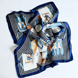 Elegant satin square scarf with a smooth, glossy finish—perfect for versatile styling as a hair accessory, neck tie, or bag accent.