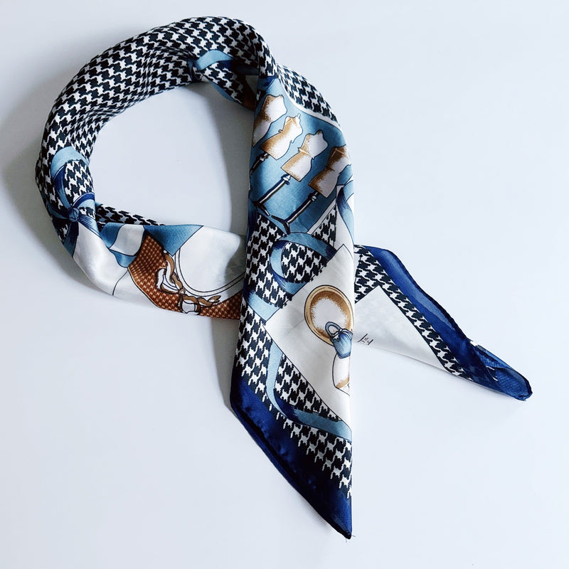 Elegant satin square scarf with a smooth, glossy finish—perfect for versatile styling as a hair accessory, neck tie, or bag accent.
