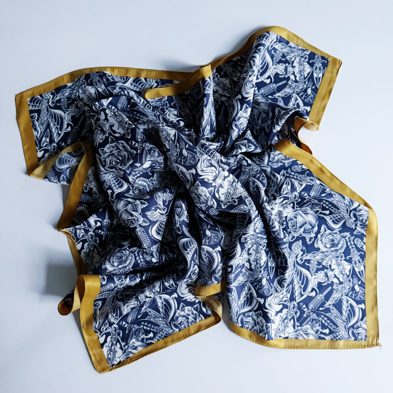Elegant satin square scarf with a smooth, glossy finish—perfect for versatile styling as a hair accessory, neck tie, or bag accent.