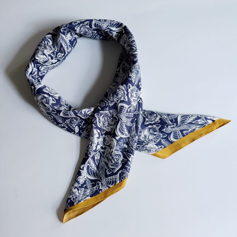 Elegant satin square scarf with a smooth, glossy finish—perfect for versatile styling as a hair accessory, neck tie, or bag accent.