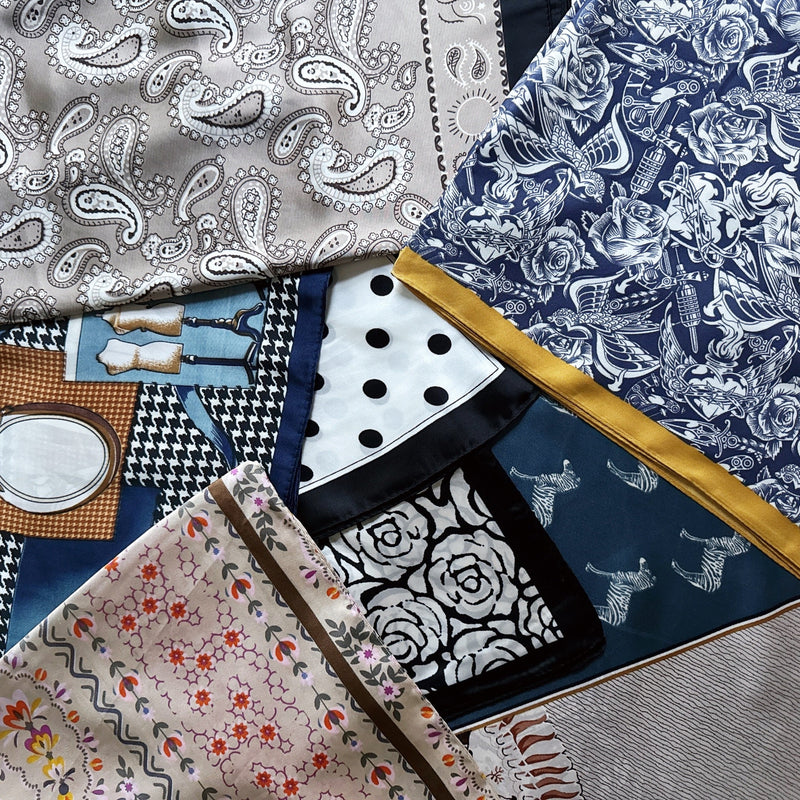 Elegant satin square scarf with a smooth, glossy finish—perfect for versatile styling as a hair accessory, neck tie, or bag accent.