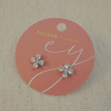 Silver-tone stud earrings in a floral clover shape, each featuring four pear-shaped cubic zirconia stones arranged in a symmetrical pattern for a radiant and delicate sparkle.