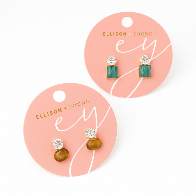 Chic stud earrings featuring a combination of a shimmering stone and polished natural stone accent. These earrings blend refined sparkle with modern design, perfect for elevating both casual and dressy looks.