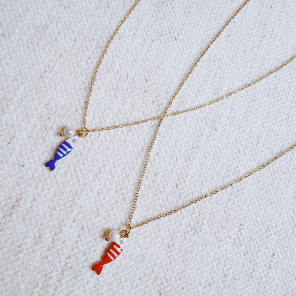 Brass necklace with red fish charm and pearl – cute nautical vibe