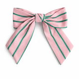 Striped ribbon bow hair clips in pastel pink with green stripes and soft yellow with blue stripes. The Striped Ribbon Bow Hair Clip – Classic Preppy Style adds a charming, polished accent to any hairstyle, blending playful color with timeless sophistication.