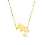 Gold-tone chain necklace featuring a bold Gothic-style initial charm that hangs asymmetrically to the side, adding a vintage-inspired yet edgy detail to your layered look.