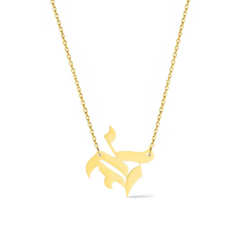 Gold-tone chain necklace featuring a bold Gothic-style initial charm that hangs asymmetrically to the side, adding a vintage-inspired yet edgy detail to your layered look.