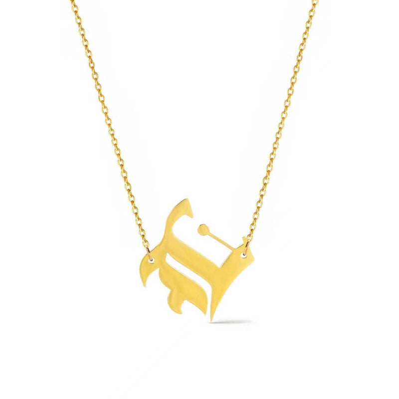 Gold-tone chain necklace featuring a bold Gothic-style initial charm that hangs asymmetrically to the side, adding a vintage-inspired yet edgy detail to your layered look.