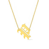 Gold-tone chain necklace featuring a bold Gothic-style initial charm that hangs asymmetrically to the side, adding a vintage-inspired yet edgy detail to your layered look.
